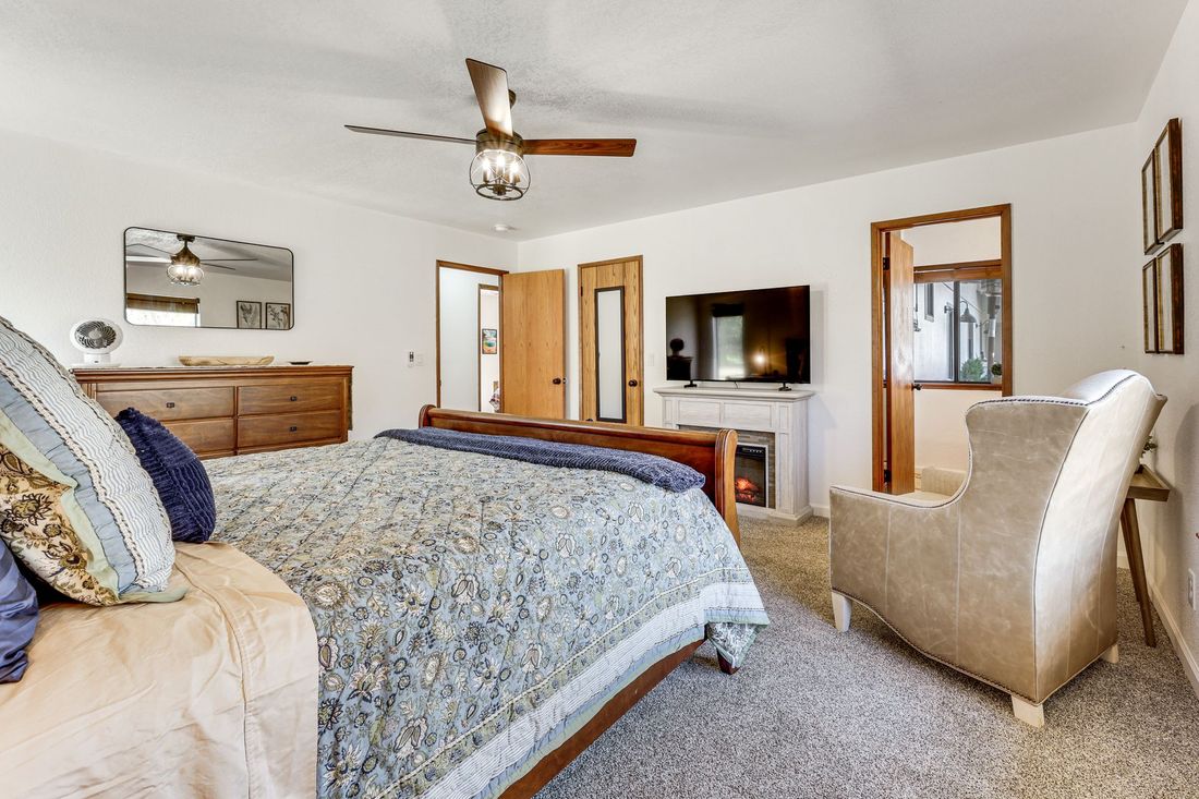 Bedroom 1 — king & fireplace